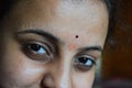 Eyes of a Indian girl with traditoinal bindi on her forehead