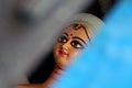 Eyes of Maa Durga. Idol of Hindu Goddess Durga during preparations in Kolkata.