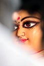 Eyes of Maa Durga. Idol of Hindu Goddess Durga during preparations in Kolkata. Royalty Free Stock Photo