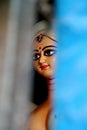 Eyes of Maa Durga. Idol of Hindu Goddess Durga during preparations in Kolkata.