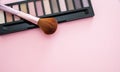 Eyeshadow pallete kit against pink background, copy space Royalty Free Stock Photo