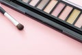 Eyeshadow pallete kit against pink background, copy space Royalty Free Stock Photo