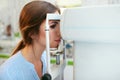 Eyesight Exam. Woman Checking Eye Vision On Optometry Equipment Royalty Free Stock Photo