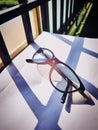 Eyewear placed on white paper on table