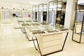 Eyewear and sunglasses in optician store Royalty Free Stock Photo