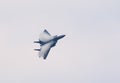 F-15 jet fighter with condensation clouds