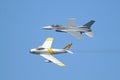 F-16 and F-86 airplanes in formation