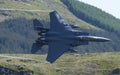 F-15E Strike Eagle flying through the Mach Loop Royalty Free Stock Photo