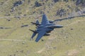 F-15E Strike Eagle flying through the Mack Loop Royalty Free Stock Photo