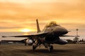 F16 falcon fighter jet on sunset background Royalty Free Stock Photo