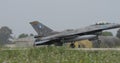 F16 Fighter Jet Lands in Heavy Rain Creating Spectacular Visuals