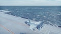 F-35 fighter takes off vertically from the aircraft carrier. 3D Rendering