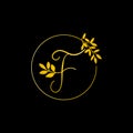 F Gold letter and Gold Leaf logo design. F Letter golden initial luxury Boutique Nature Floral Flower. F Monogram vector design