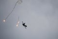 F16 Hellenic Air Force dropping flares during maneuvers over Kalamata during Air Force Celebration Royalty Free Stock Photo