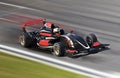 F1 race car racing on a track with motion blur Royalty Free Stock Photo