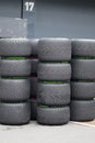 F1 racing tires stacked on top of each other