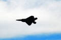 An F22 Raptor streaks across the sky Royalty Free Stock Photo