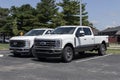 F-350 4X4 Crew Cab and F-250 display at a dealership. Ford F-Series trucks are the best selling pickups in the US Royalty Free Stock Photo