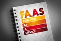 FAAS - Function As A Service acronym on notepad, concept background Royalty Free Stock Photo