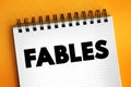 Fables text concept on notepad for presentations and reports