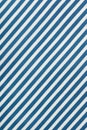 Fabric background in diagonal blue and white stripe, cotton texture