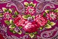 Fabric background with Russian folk patterns and flowers. Royalty Free Stock Photo