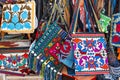 fabric bags with traditional bright colorful Asian pattern at the oriental bazaar in Uzbekistan close-up