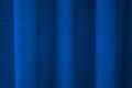 Fabric blue curtains with folds . Abstract background, curtain, drapes blue fabric. Royalty Free Stock Photo