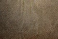 Fabric brown texture background. Close up of a textured fabric.