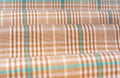 Checkered fabric. Checkered pattern on fabric of different colors. Material for clothing Royalty Free Stock Photo