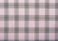 Checkered fabric. Checkered pattern on fabric of different colors. Material for clothing Royalty Free Stock Photo