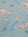 fabric with Cinnamoroll Sanrio Cute Pattern Background with Study and School Elements printed on Royalty Free Stock Photo