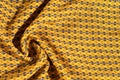 Fabric cotton is brown with a pattern of circles. Smooth and chi Royalty Free Stock Photo