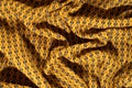 Fabric cotton is brown with a pattern of circles. Smooth and chi Royalty Free Stock Photo