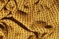 Fabric cotton is brown with a pattern of circles. Smooth and chi Royalty Free Stock Photo