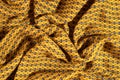 Fabric cotton is brown with a pattern of circles. Smooth and chi Royalty Free Stock Photo