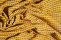 Fabric cotton is brown with a pattern of circles. Smooth and chi Royalty Free Stock Photo