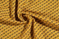 Fabric cotton is brown with a pattern of circles. Smooth and chi Royalty Free Stock Photo