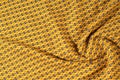 Fabric cotton is brown with a pattern of circles. Smooth and chi Royalty Free Stock Photo