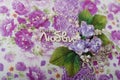 Fabric covered weddig scrapbook album with purple lace, flowers and inscription in Russian reads - Love story.