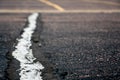 fabric coving on top of an asphalt crack repair