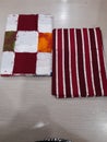 Fabric with dominant colors of Maroon and white