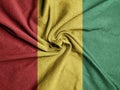 Fabric Flag of the Guinea, National Flag of the Guinea Royalty Free Stock Photo