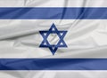 Fabric flag of Israel. Crease of Israeli flag background.