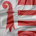 Fabric flag of Jura. Crease of Jura flag background, The canton of Switzerland.