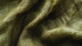 Fabric in khaki green color. Texture of crumpled green fabric as background, close-up. Royalty Free Stock Photo