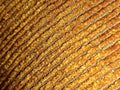 fabric knitted texture from gold colored thread Royalty Free Stock Photo