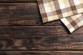 Fabric napkins on wooden background Royalty Free Stock Photo