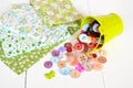 Fabric pieces with flower pattern, multi-colored prong-set. Sewing concept Royalty Free Stock Photo