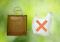 Fabric and plastic bag optional for environment concern on green background Royalty Free Stock Photo